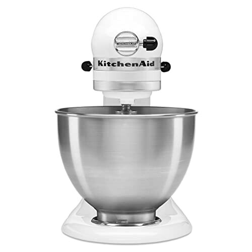 White KitchenAid stand mixer with stainless steel bowl