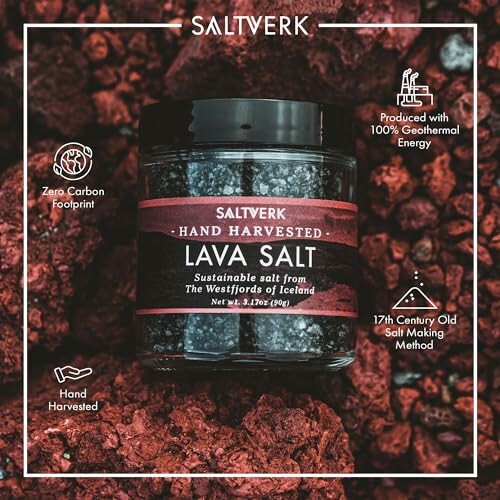 Saltverk hand-harvested lava salt jar on red volcanic rocks.